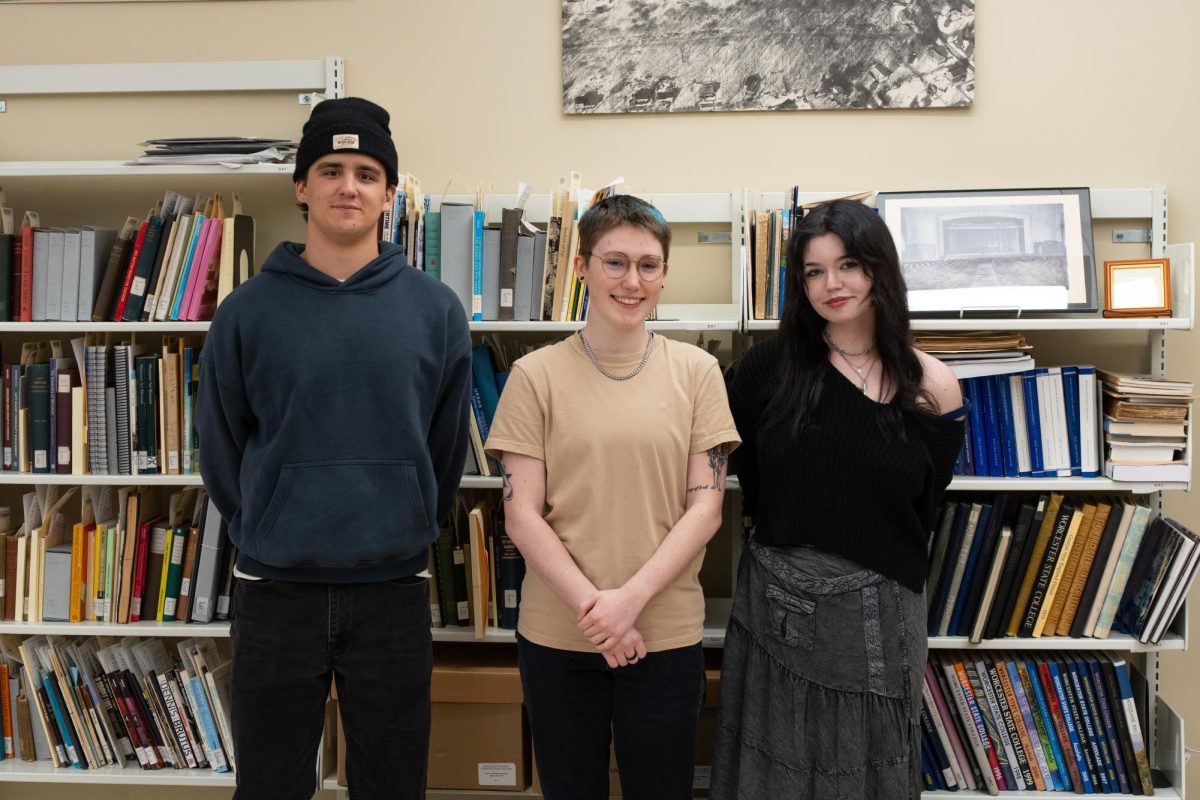 The 2024–2025 editors of the Wormtown Herald, left to right: Associate Editor Connor Williams (left), Editor-in-Chief Dakota Gelinas (center), Associate Editor Sydney Anderson (right).