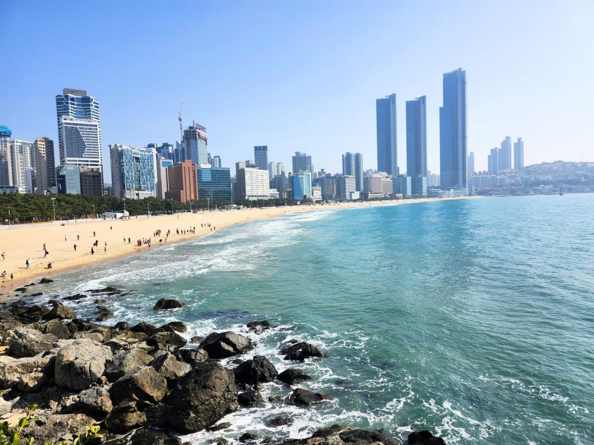 The city's skyline overlooks Busan's Haeundae Beach. 